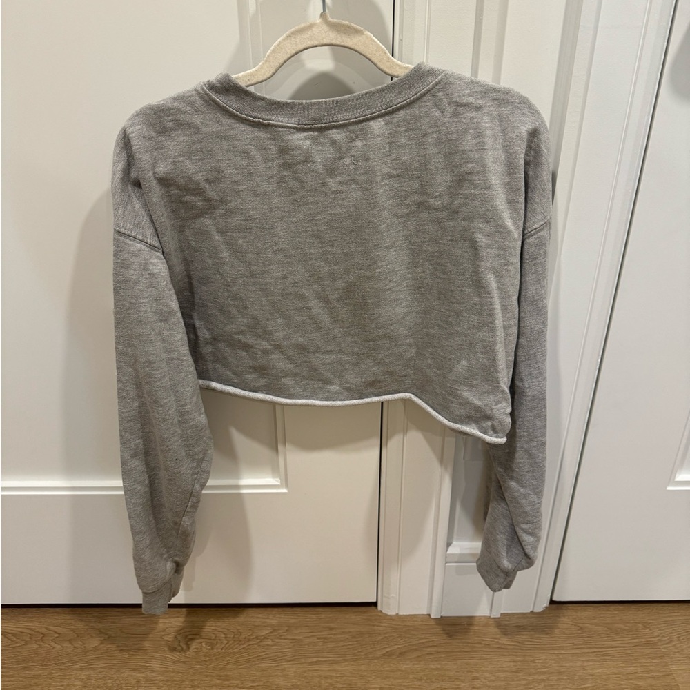 Pretty little thing 
Cropped grey sweater